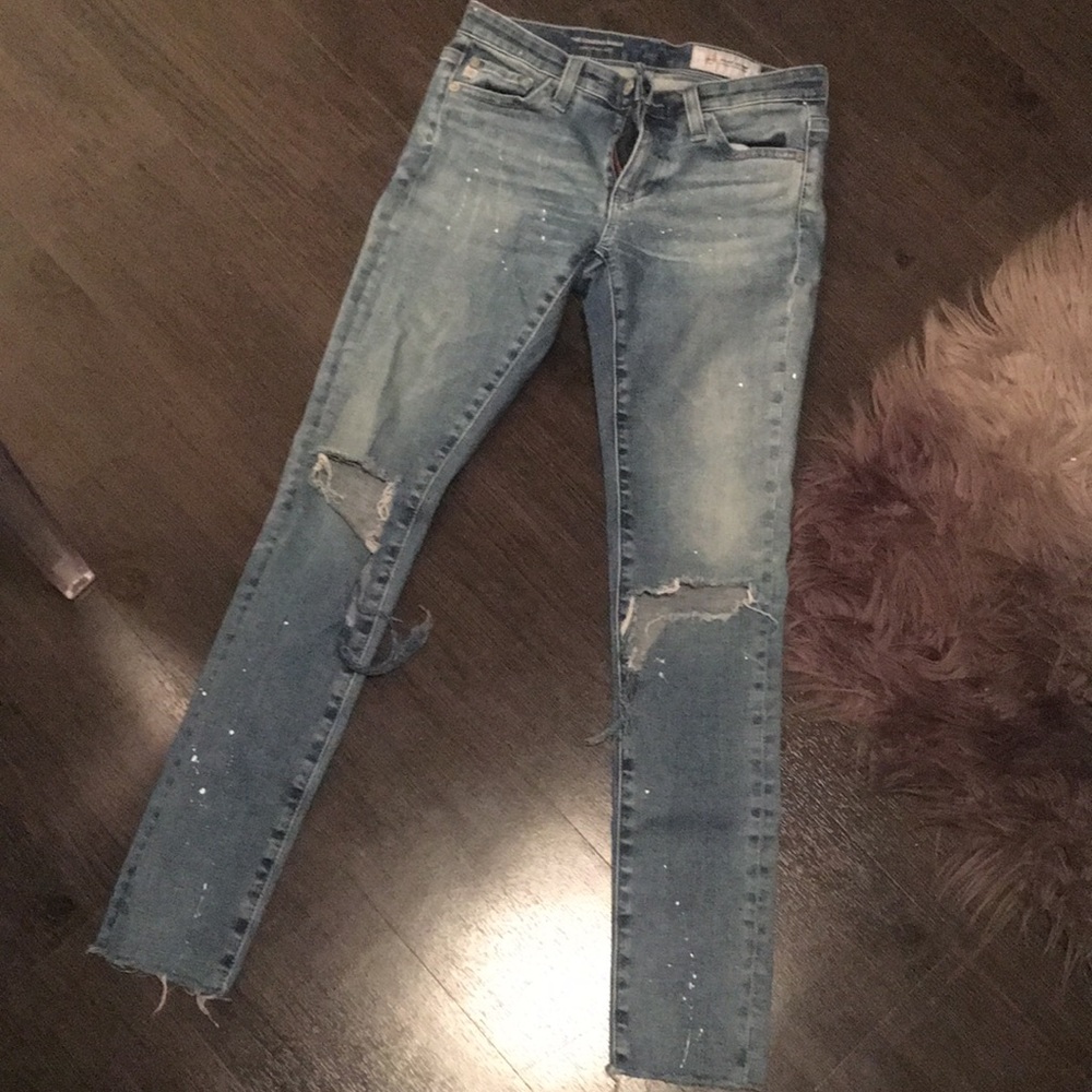 AG cropped paint splatter distressed jeans